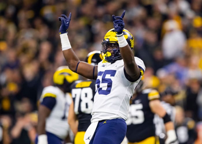 Dec 4, 2021; Indianapolis, IN, USA; Michigan Wolverines linebacker David Ojabo (55) celebrates a play against the Iowa Hawkeyes in the Big Ten Conference championship game at Lucas Oil Stadium. Mandatory Credit: Mark J. Rebilas-USA TODAY Sports